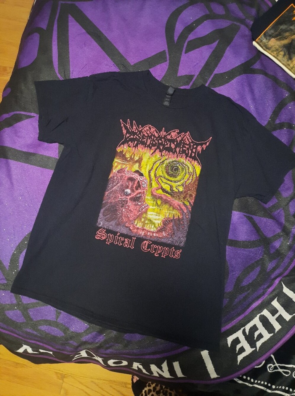 Black Graphic Tee with Yellow & Red Horror Artwork - Spiral Crypts